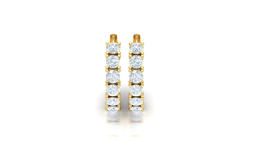 Gold hoop earrings with embedded diamonds on a white background