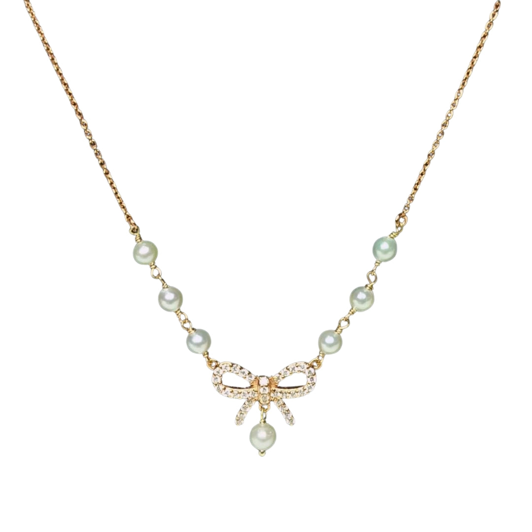 Sailor Bow Golden Diamond Pendant Necklace by Anirudh Jewels