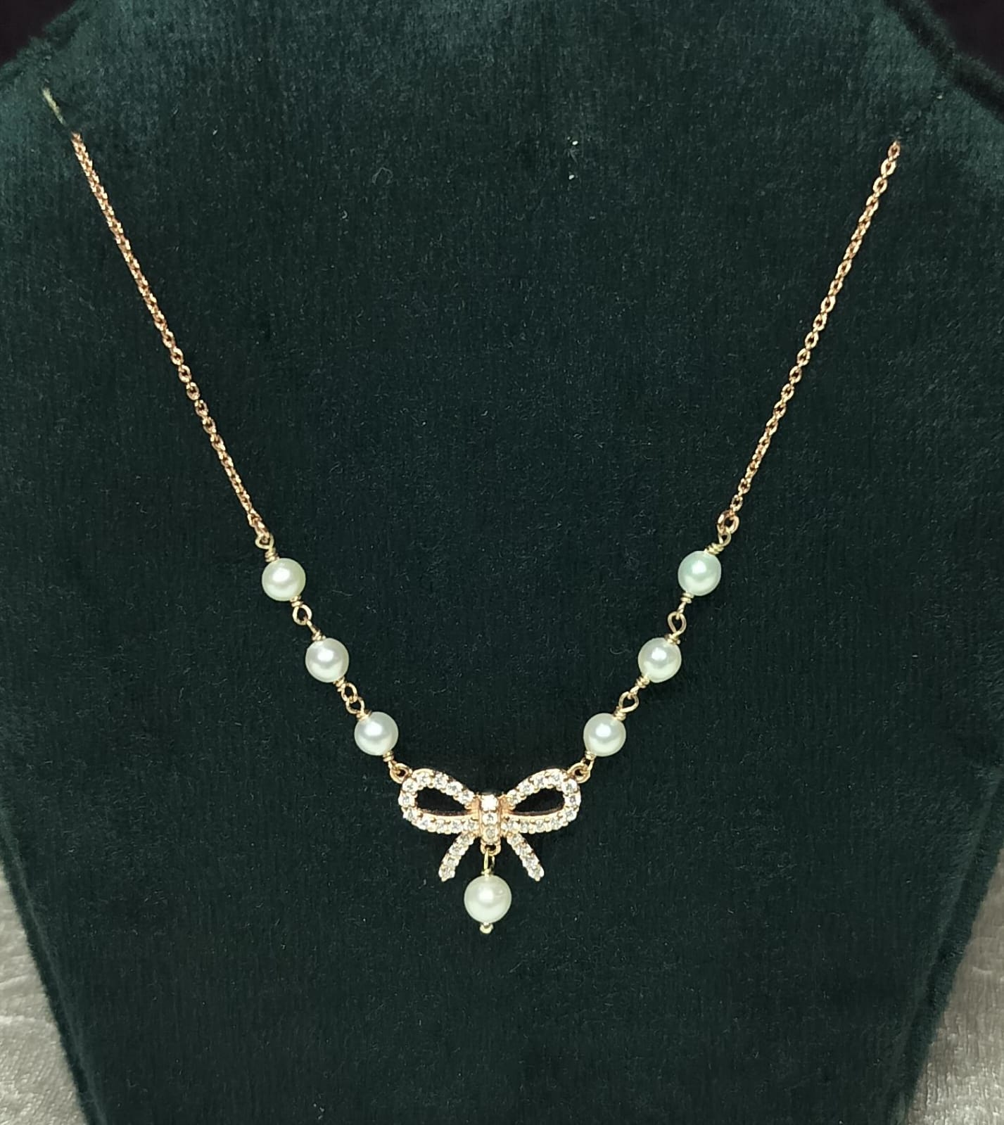 Sailor Bow Golden Diamond Pendant Necklace by Anirudh Jewels