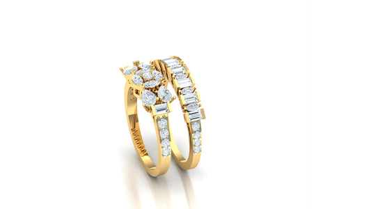 Gold ring with diamond accents on a white background