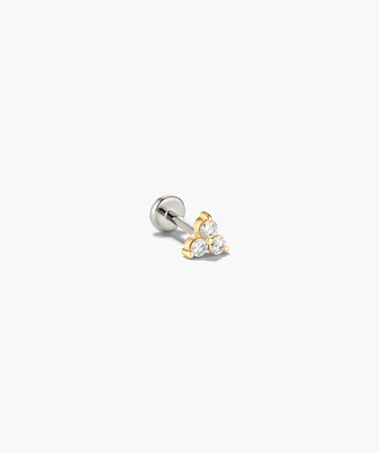 Single stud earring with clear gemstone on a white background
