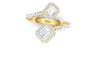 Gold ring with emerald-cut diamond and diamond halo on a white background