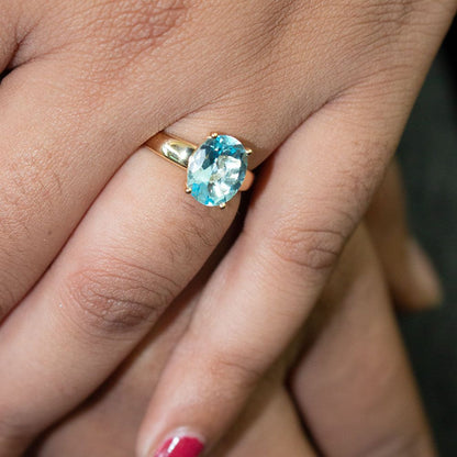 Elegant  Blue Topaz Gold Solitaire Ring