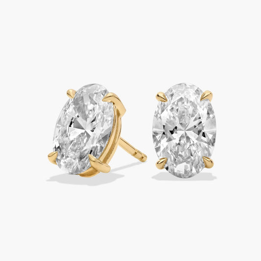 Oval Diamond Halo Style Earrings in Gold