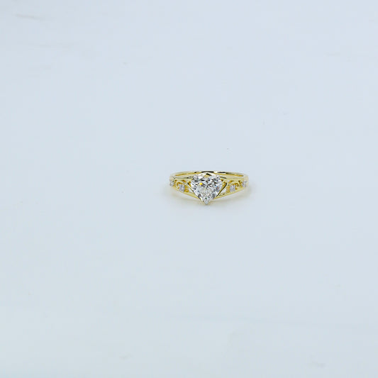 Heart-shaped diamond ring on a light gray background