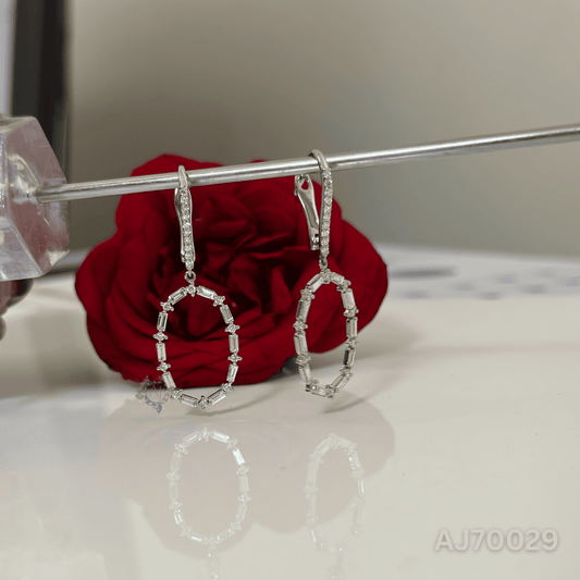Oval Radiance Baguette Earrings By Anirudh Jewels