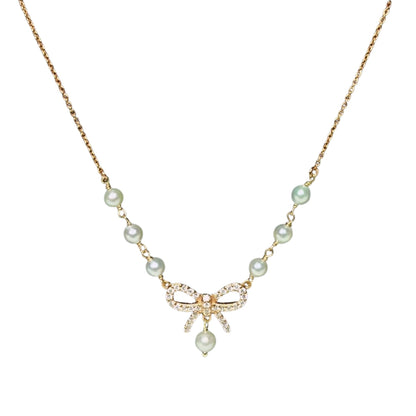 Sailor Bow Golden Diamond Pendant Necklace by Anirudh Jewels