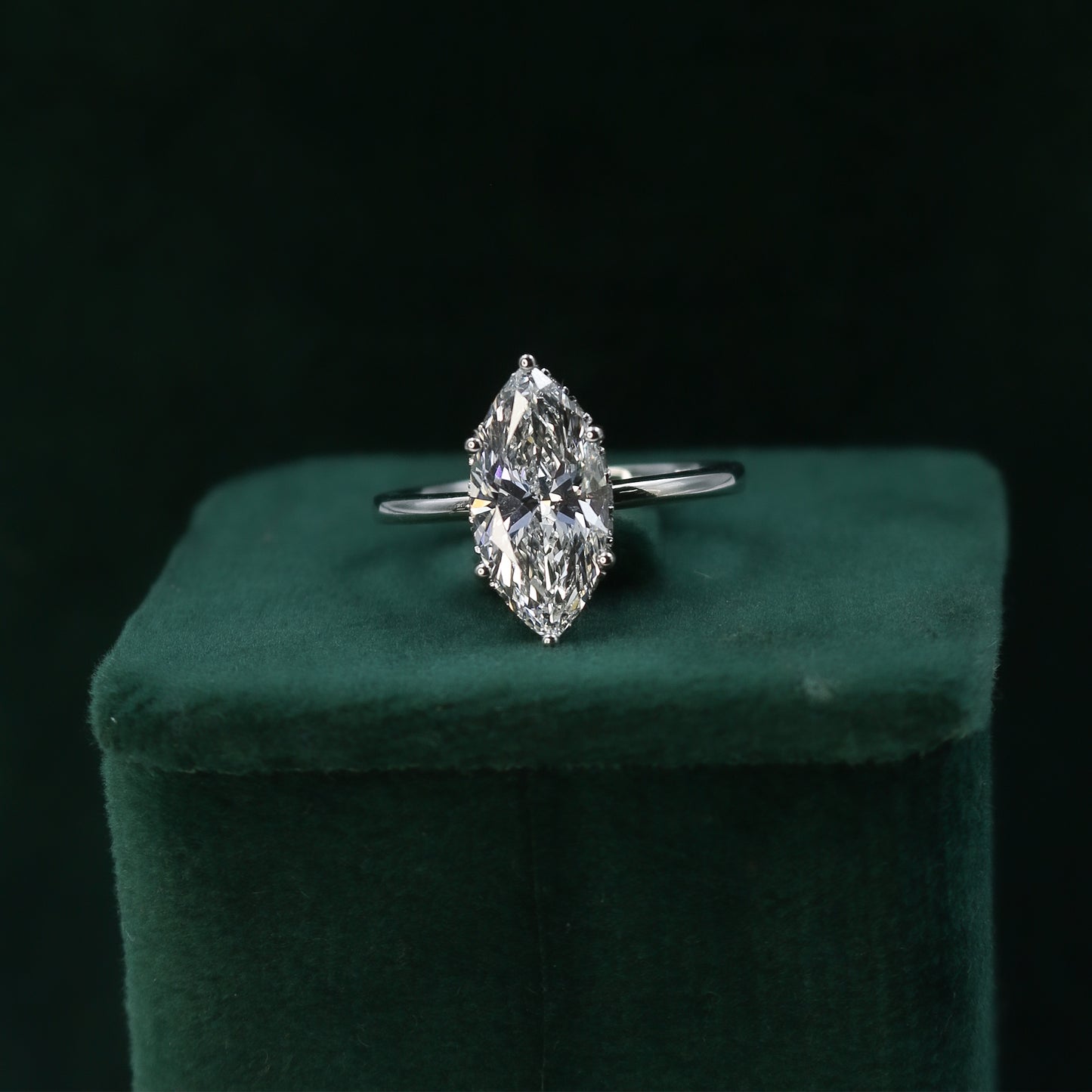 White Gold Marquise Solitaire Diamond Ring with Hidden Accents