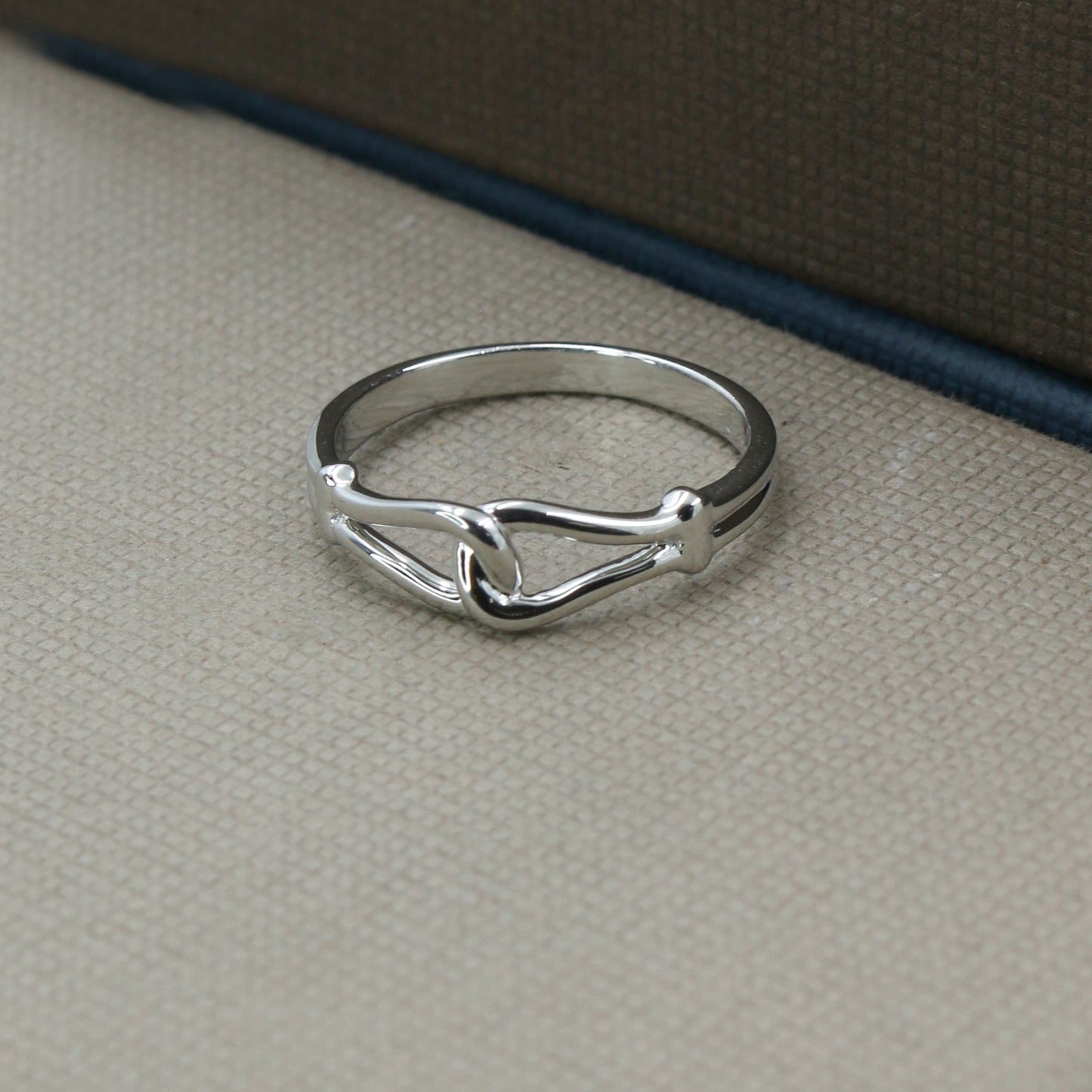 Sleek White Gold Love Knot Ring