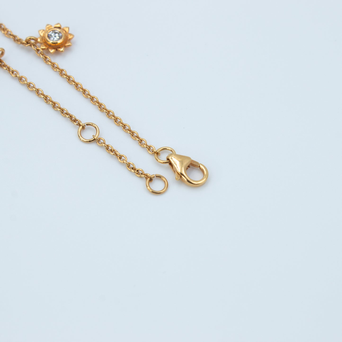 Elegant Ruby & Diamond Charm Gold Bracelet