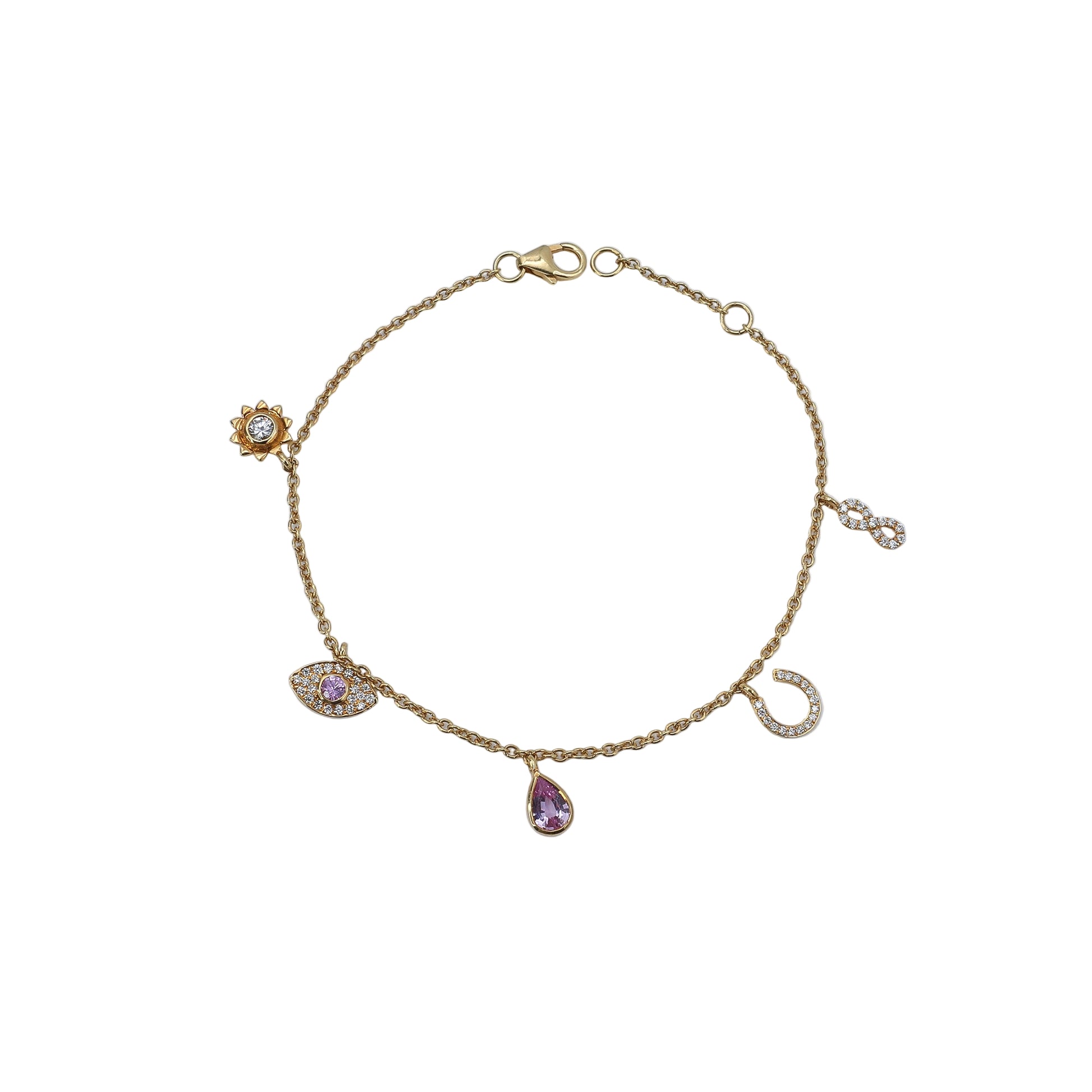 Gold bracelet with charms on a light blue background