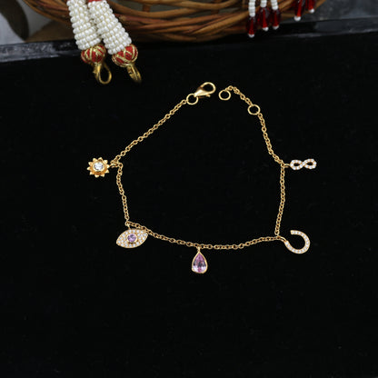 Elegant Ruby & Diamond Charm Gold Bracelet