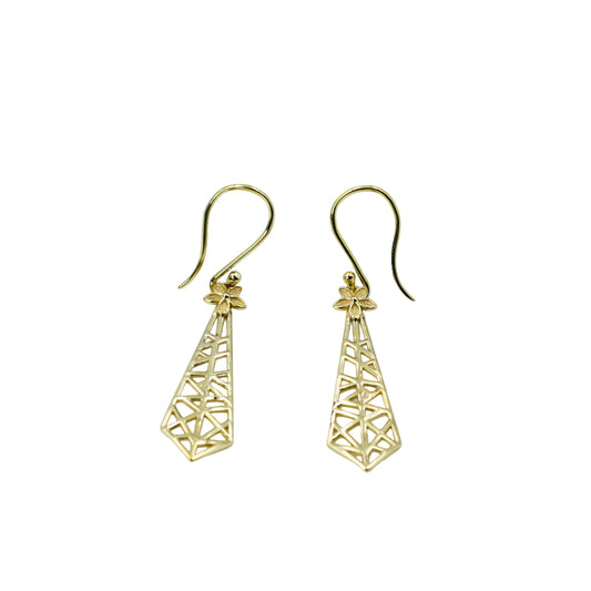 Gold geometric earrings of Anirudh Jewels on a light blue background