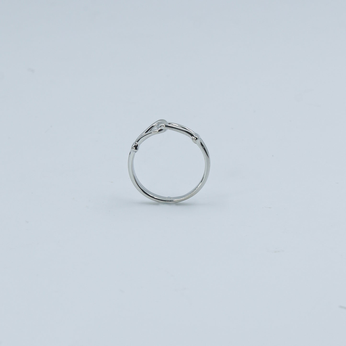 Sleek White Gold Love Knot Ring