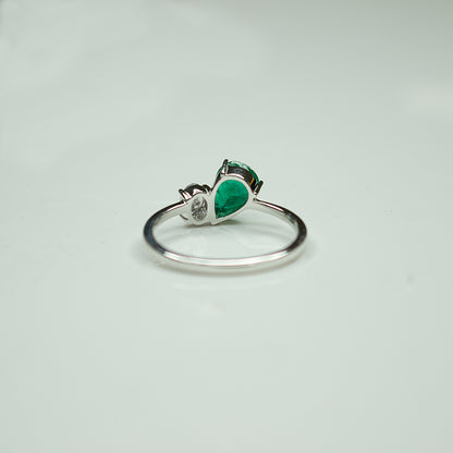 Pear Shape Emerald and Round Diamond Two-Stone Bypass Ring in 14K White Gold