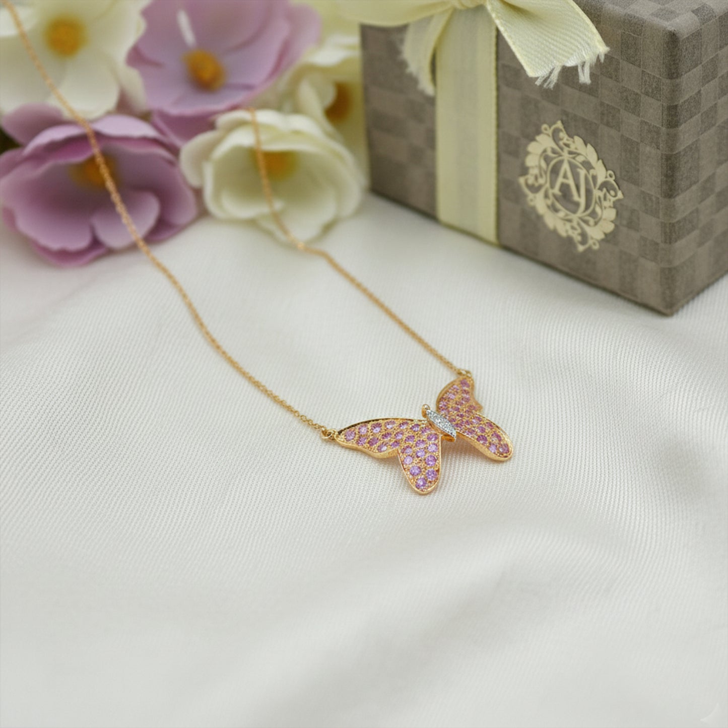 Pink Sapphire & Diamond Butterfly Pendant in Gold