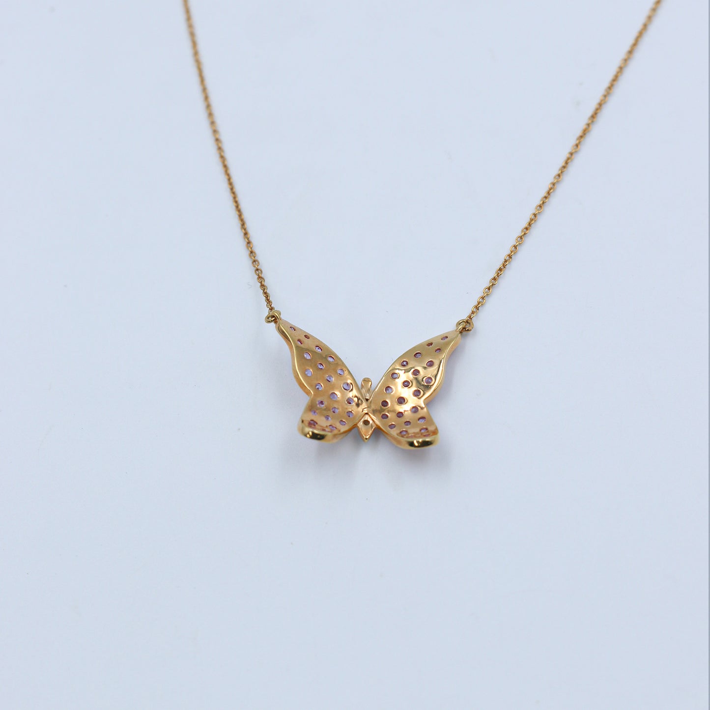 Pink Sapphire & Diamond Butterfly Pendant in Gold