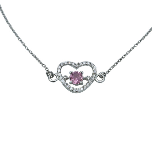 Necklace with a heart-shaped pendant featuring a pink gemstone on a light gray background