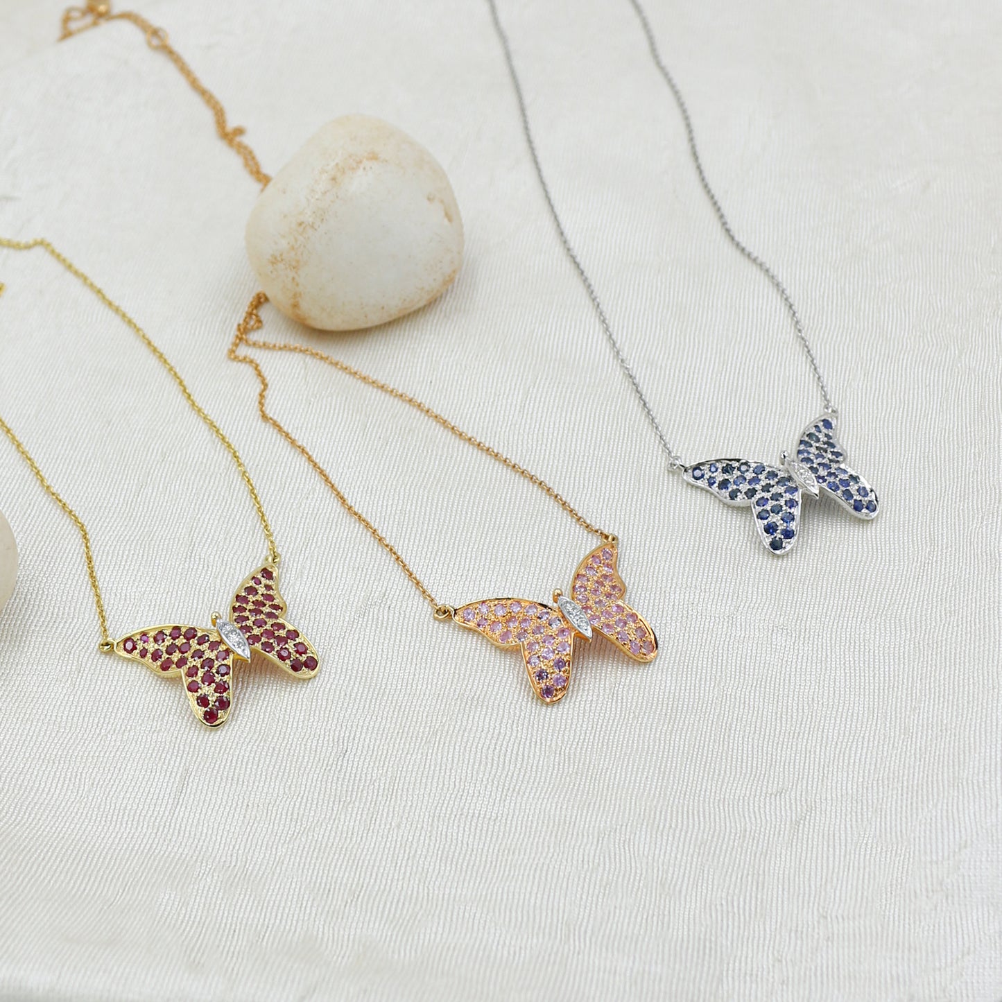 Pink Sapphire & Diamond Butterfly Pendant in Gold