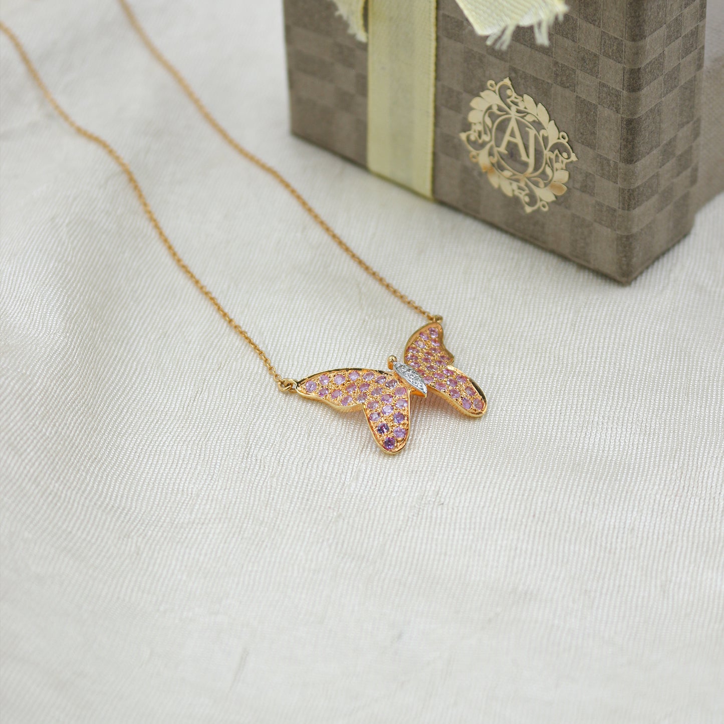 Pink Sapphire & Diamond Butterfly Pendant in Gold