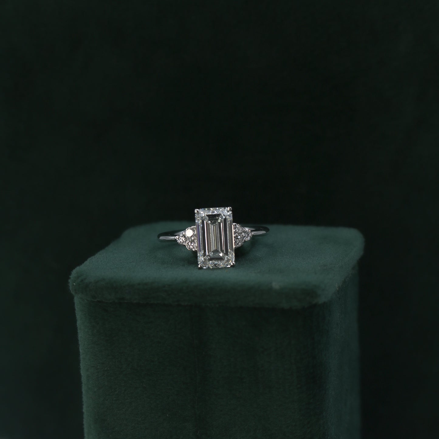 White Gold Emerald Cut Solitaire Diamond Ring with Side Accents