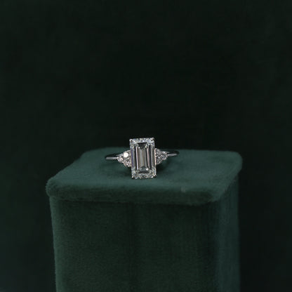 White Gold Emerald Cut Solitaire Diamond Ring with Side Accents