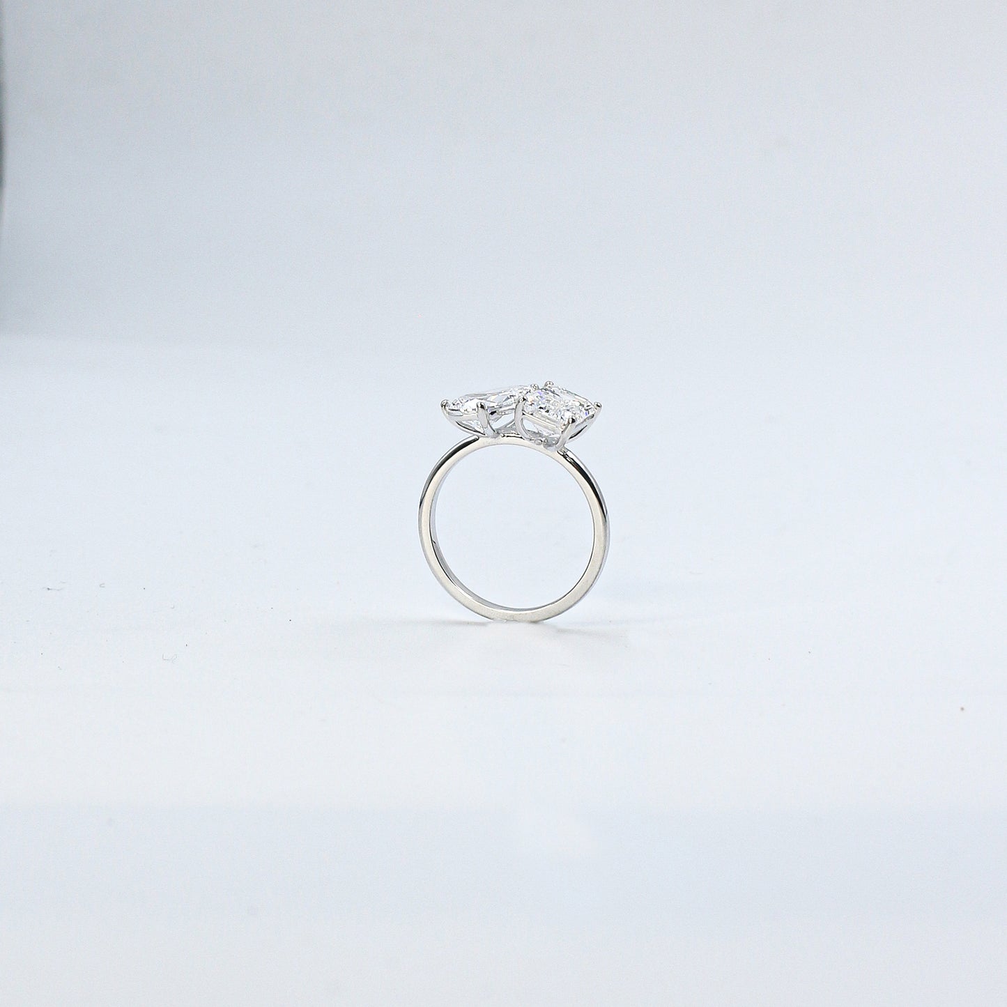 White Gold Emerald and Pear Toi et Moi Diamond Ring