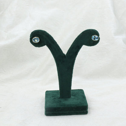 Yellow Gold Blue Topaz Oval Stud Earrings