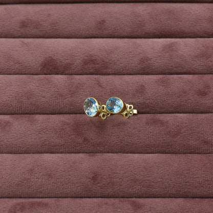 Yellow Gold Blue Topaz Oval Stud Earrings