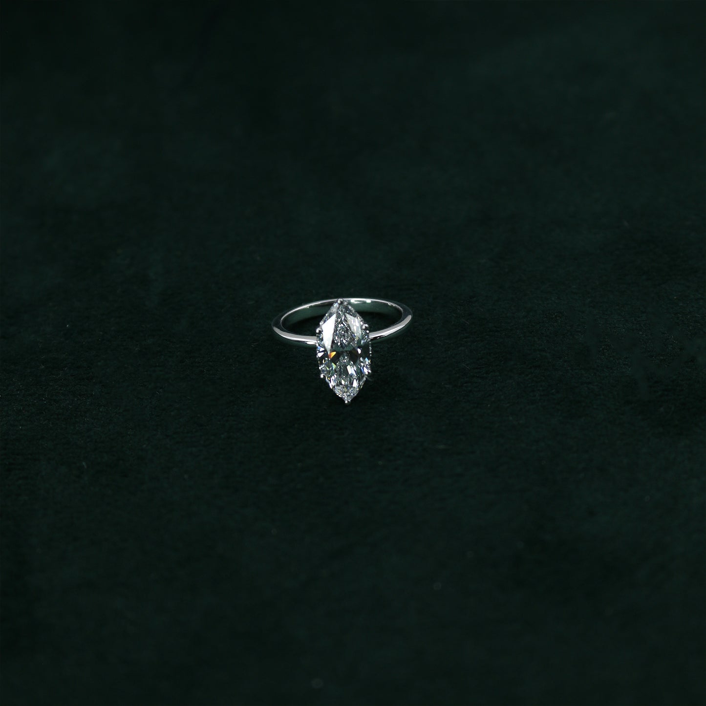 White Gold Marquise Solitaire Diamond Ring with Hidden Accents