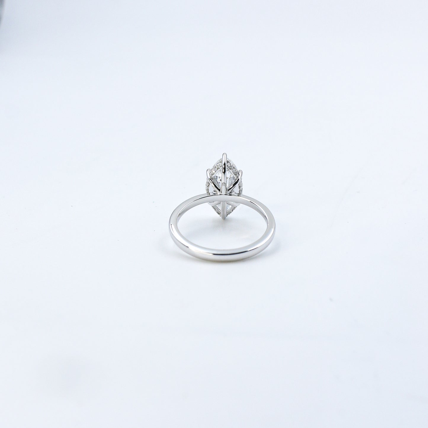 White Gold Marquise Solitaire Diamond Ring with Hidden Accents