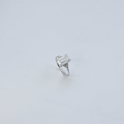 White Gold Emerald Cut Solitaire Diamond Ring with Side Accents