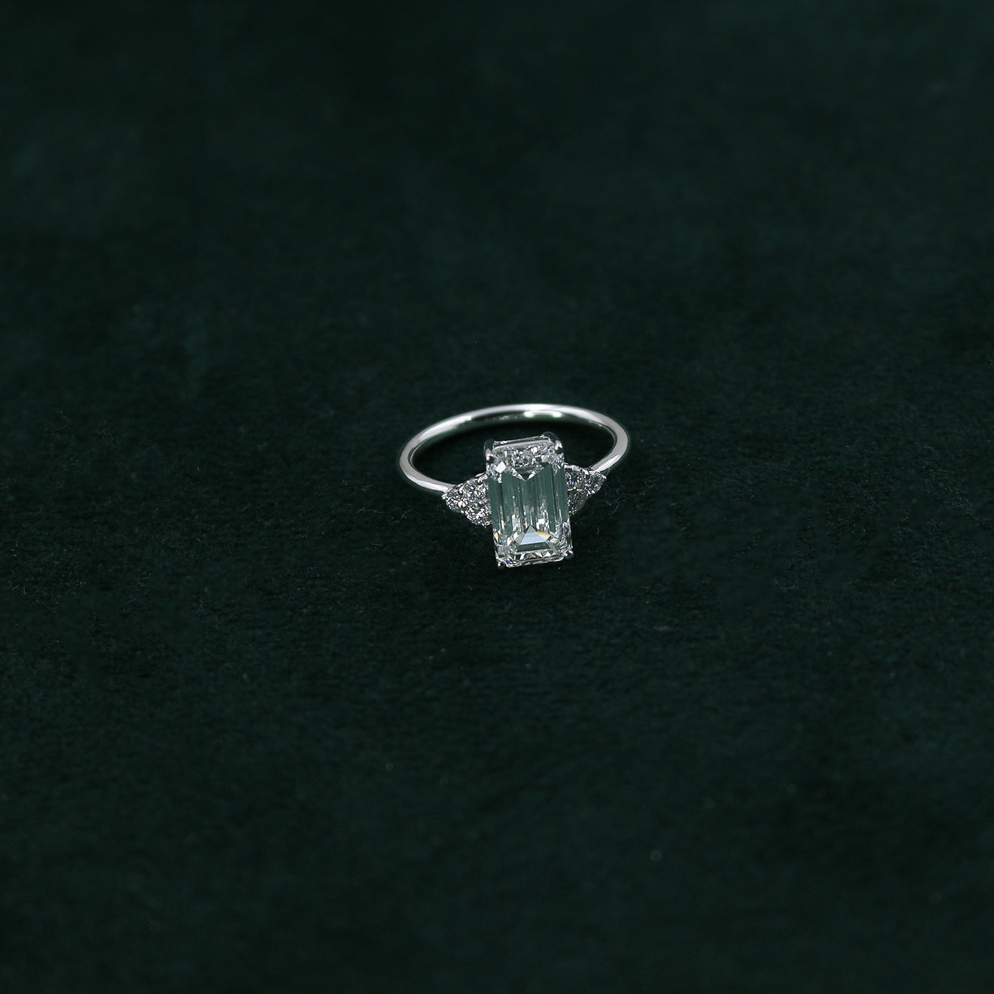 White Gold Emerald Cut Solitaire Diamond Ring with Side Accents
