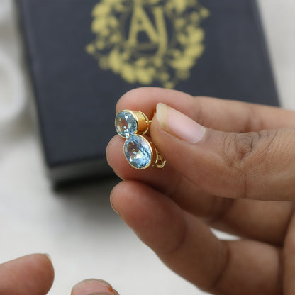 Yellow Gold Blue Topaz Oval Stud Earrings
