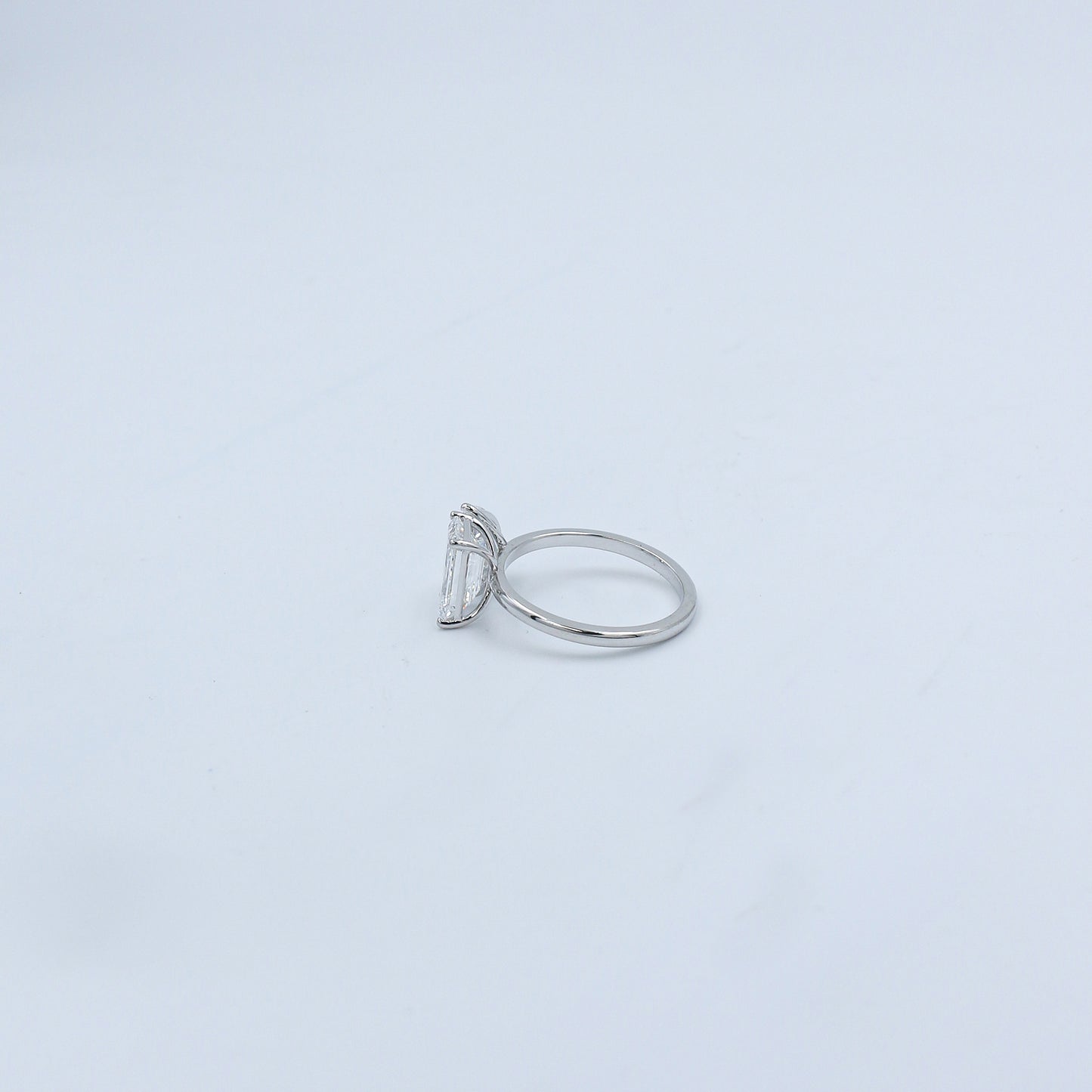 White Gold Emerald and Pear Toi et Moi Diamond Ring