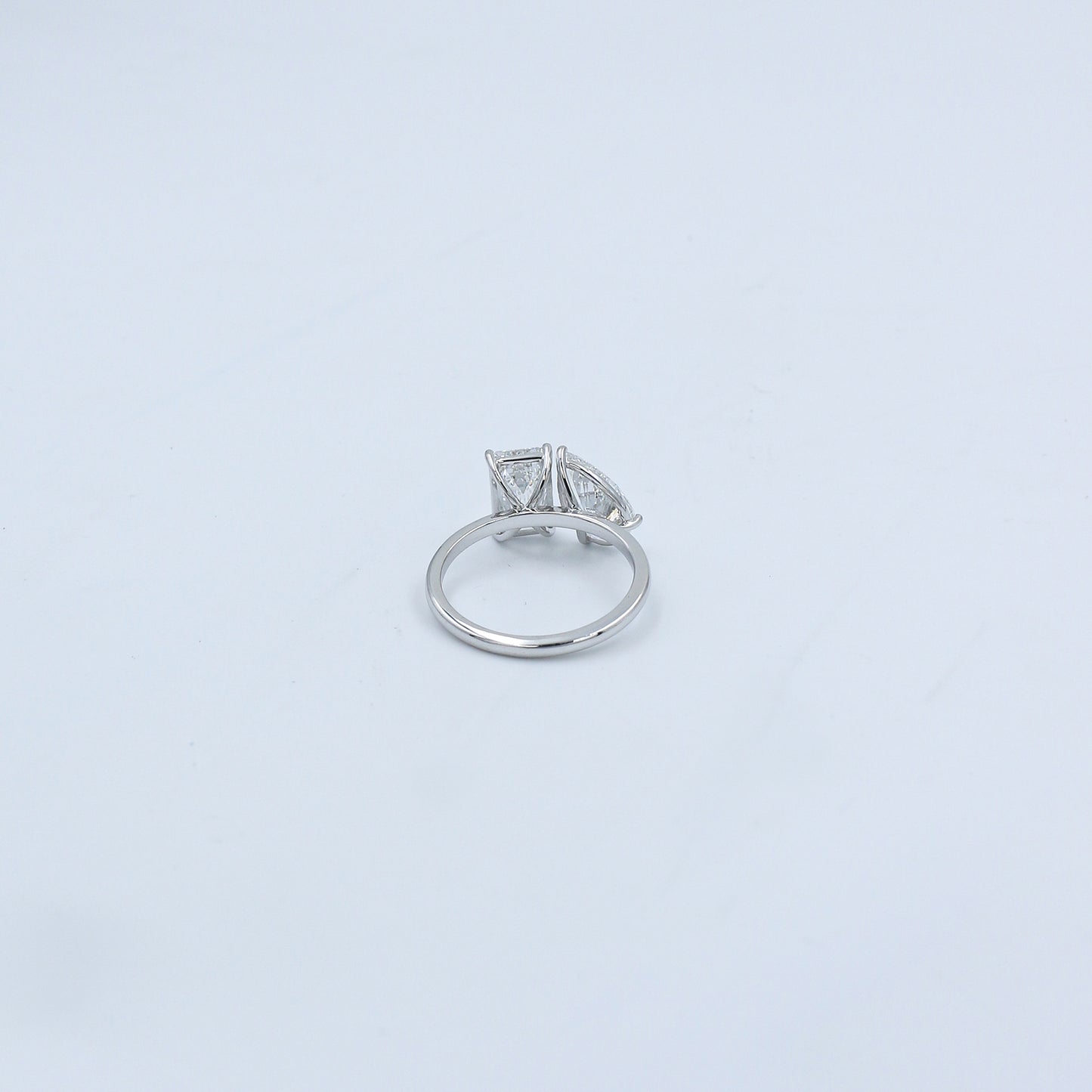 White Gold Emerald and Pear Toi et Moi Diamond Ring