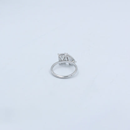 White Gold Emerald and Pear Toi et Moi Diamond Ring