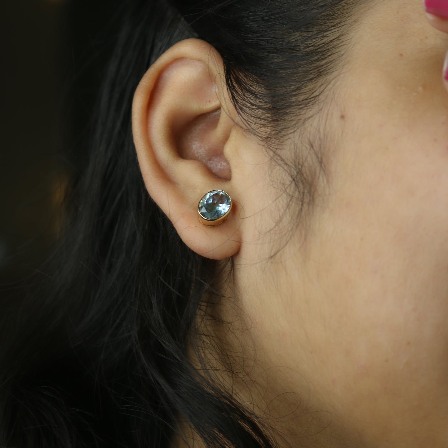 Yellow Gold Blue Topaz Oval Stud Earrings