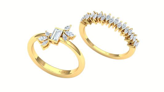 Two gold rings with diamond accents on a white background