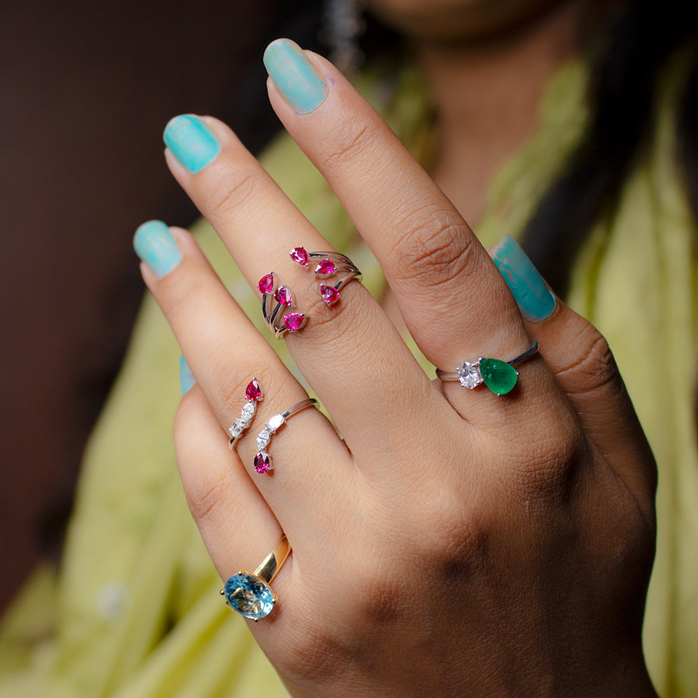 Pear Shape Emerald and Round Diamond Two-Stone Bypass Ring in 14K White Gold