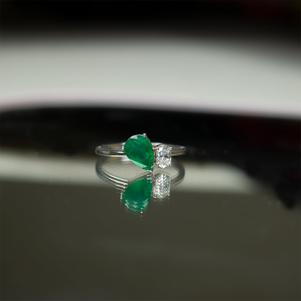 Pear Shape Emerald and Round Diamond Two-Stone Bypass Ring in 14K White Gold