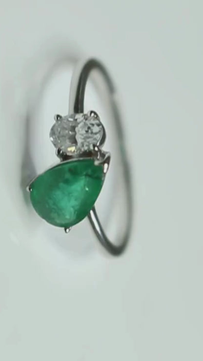 Pear Shape Emerald and Round Diamond Two-Stone Bypass Ring in 14K White Gold
